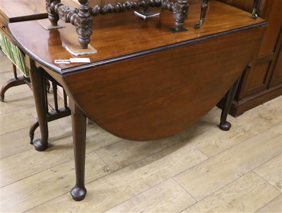 A George III mahogany drop leaf pad foot dining table W.126cm